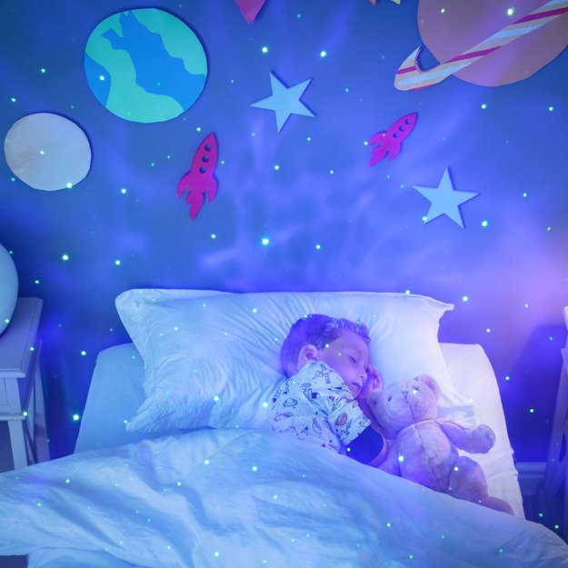 Projektoriaus astronautas gitara naktinė šviesa